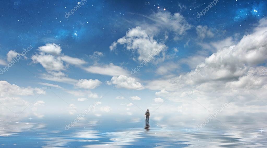 Man walking on the water with a sky — Stock Photo © kevron2002