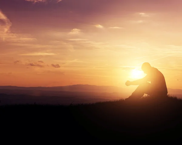 Praying at sunrise — Stock Photo, Image