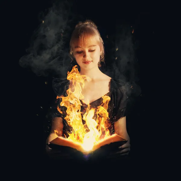 Woman with fire Bible — Stock Photo, Image