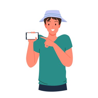 Mutlu genç adam işaret ediyor ve telefonunu gösteriyor.