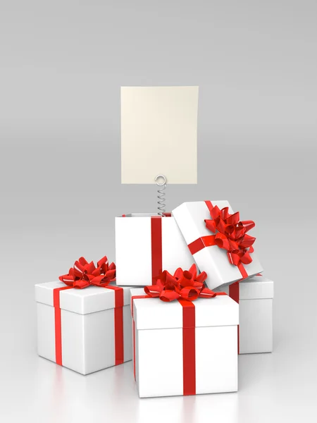 Montón de cajas de regalo con tarjeta en blanco — Foto de Stock