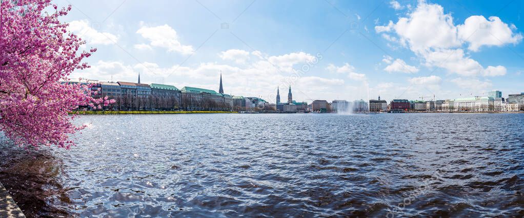 panoramic view of inner Alster lake Binnenalster in Hamburg and cityscape on sunny day in spring