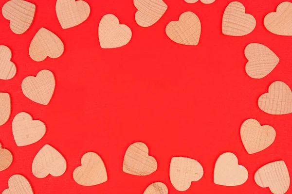 Valentines Day Border Wooden Hearts Top View Red Paper Background —  Fotos de Stock