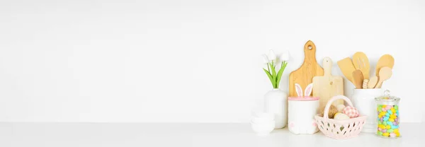 Easter Kitchenware Utensils Decor White Shelf Counter Banner White Wall — Stock Photo, Image