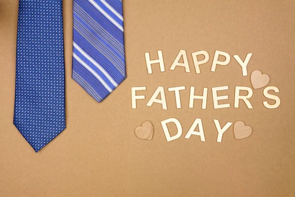 Happy Fathers Day Message Blue Neck Ties Brown Paper Background — Stock fotografie