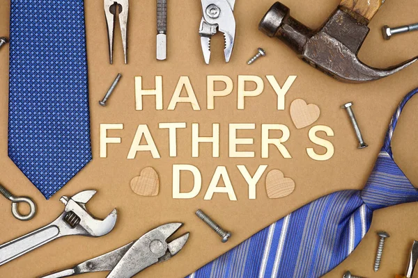 Happy Fathers Day Message Frame Ties Tools Brown Paper Background — стокове фото