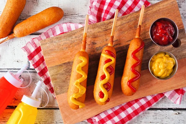 Corn Dogs Mustard Ketchup Top View Table Scene White Wood — Foto Stock