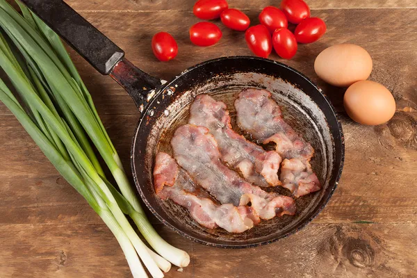 Fried the bacon. — Stock Photo, Image