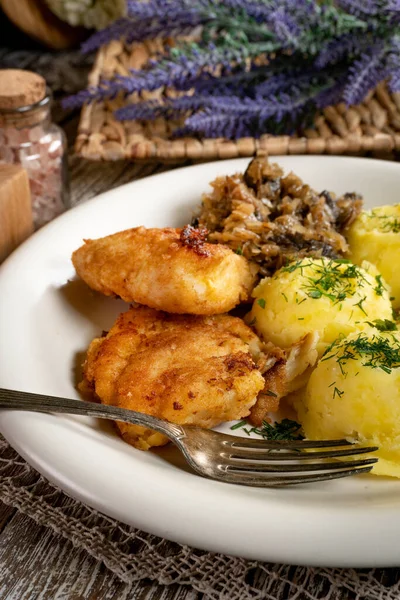 Fried Cod Fillet Served Boiled Potatoes Fried Sauerkraut Mushrooms — Stock Photo, Image