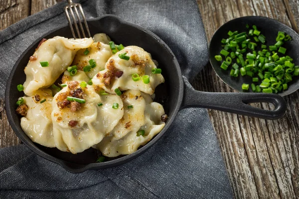 Fried Dumplings Pierogi Meat Filling Sprinkled Greaves Cast Iron Pan — Stock Photo, Image