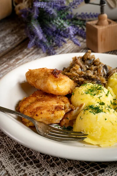 Fried Cod Fillet Served Boiled Potatoes Fried Sauerkraut Mushrooms — Stock Photo, Image