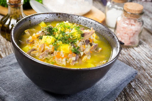 Polish barley soup with vegetables and chicken heart - krupnik.