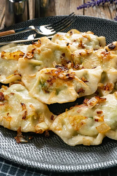 Fried Dumplings Pierogi Spinach Filling Sprinkled Greaves — Stock Photo, Image