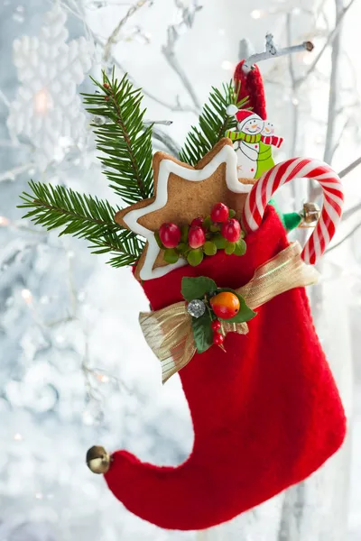 Christmas stocking with gifts — Stock Photo, Image