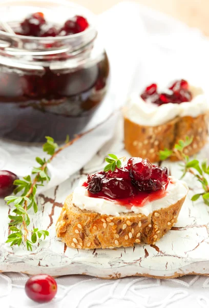 Toast with cranberry jam — Stock Photo, Image