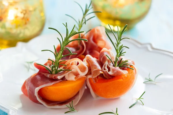 Prosciutto with apricots — Stock Photo, Image