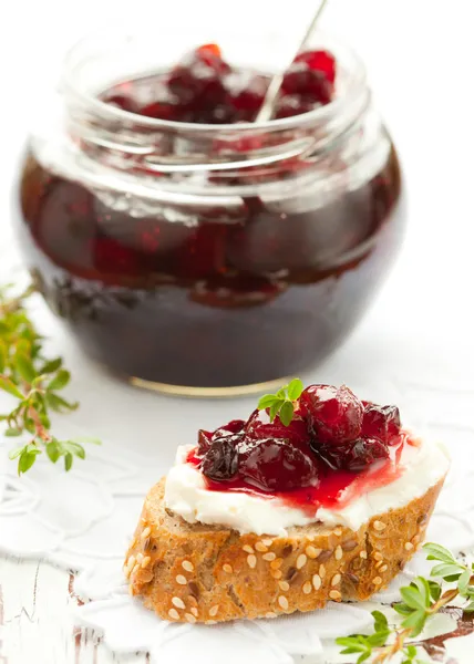 Toast with cranberry jam — Stock Photo, Image