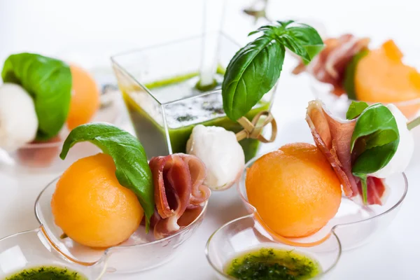 Melon, mozzarella and prosciutto — Stock Photo, Image