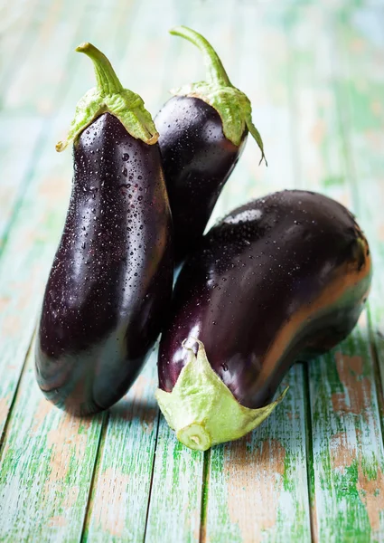 Drie aubergines — Stockfoto