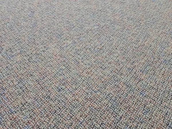 Grey and brown carpet or rug on floor or ground — Stock Photo, Image