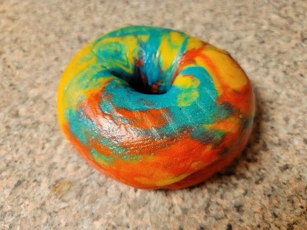 Colorful Bright Rainbow Bagel Bread Many Colors Counter — Stock Photo, Image
