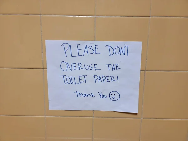 Please Don Overuse Toilet Paper Sign Bathroom Restroom Wall — Stock Photo, Image