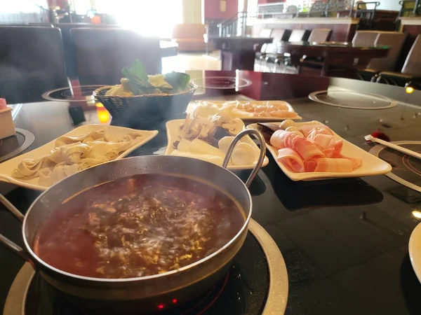 Spicy Chinese Hot Pot Cabbage Pork Noodles Table — Stock Photo, Image