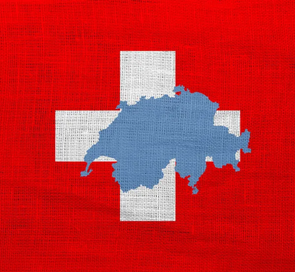 Flaga i mapę Szwajcarii na worze — Zdjęcie stockowe