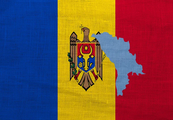 Flag and map of Moldova on a sackcloth — Stock Photo, Image