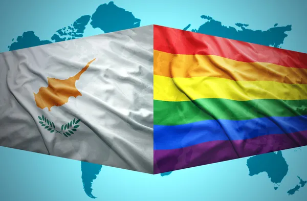 Waving Cypriot and Gay flags — Stock Photo, Image