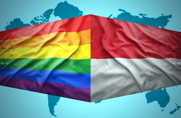 Waving Indonesian and Gay flags — Stock Photo, Image