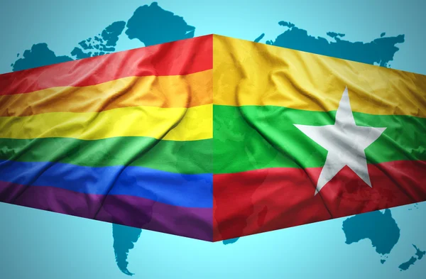 Viftande myanmar och gay flaggor — Stockfoto