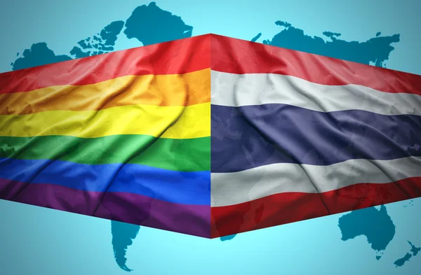 Waving Thai and Gay flags — Stock Photo, Image