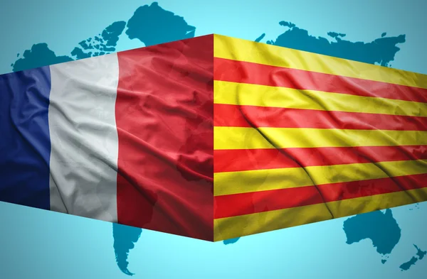 Waving Catalonia and French flags — Stock Photo, Image