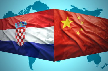 Hırvat ve Çin bayraklar sallayarak