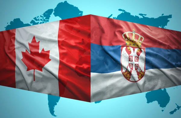 Waving Serbian and Canadian flags — Stock Photo, Image