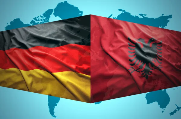 Waving Albanian and German flags — Stock Photo, Image