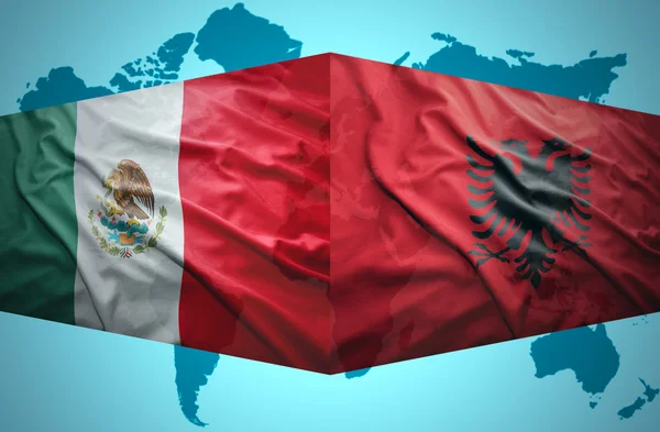 Waving Albanian and Mexican flags — Stock Photo, Image