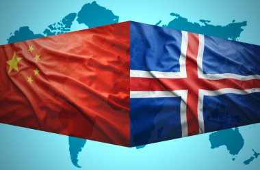 İzlanda ve Çin bayraklar sallayarak