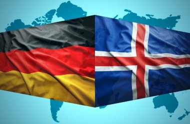 İzlanda ve Alman bayrakları sallayarak