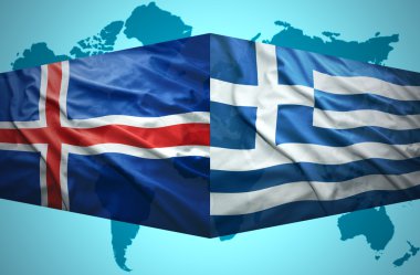 İzlanda ve Yunan bayraklarını sallayarak