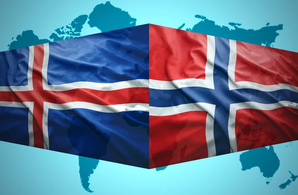 Acenando bandeiras da Islândia e da Noruega — Fotografia de Stock
