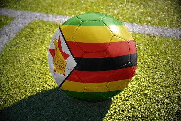 Football Ball National Flag Zimbabwe Lies Green Field White Line — Stock Photo, Image