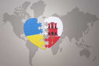 Ukrayna 'nın ulusal bayrağı ve dünya haritasının arka planında Cebelitarık' ın yapboz kalbi. Kavram. 3B illüstrasyon