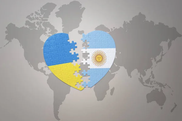 Puzzle Srdce Národní Vlajkou Ukrajiny Argentiny Pozadí Mapy Světa Koncept — Stock fotografie