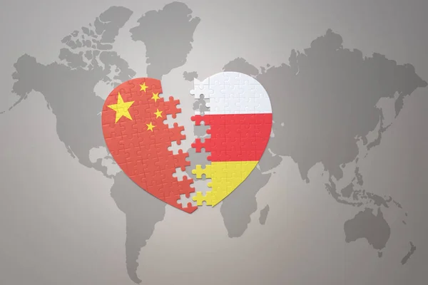 パズルハートは中国と南オセチアの国旗を背景にした世界地図です コンセプト 3Dイラスト — ストック写真
