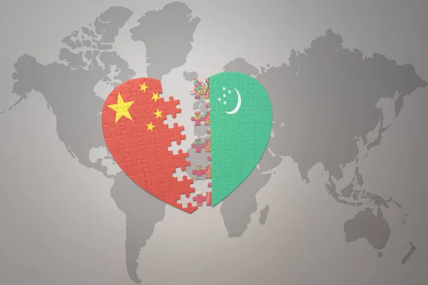 パズルハートで中国とトルクメニスタンの国旗を背景に世界地図を作りました コンセプト 3Dイラスト — ストック写真