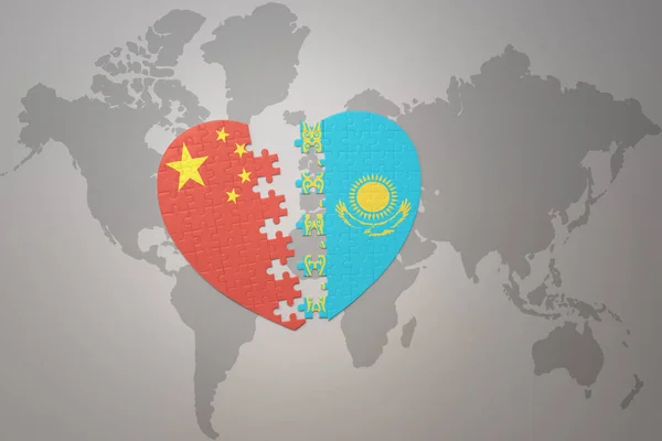 中国の国旗とカザフスタンの国旗を背景にパズルハートです コンセプト 3Dイラスト — ストック写真