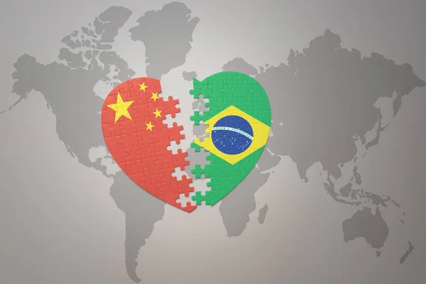 パズルハートは中国とブラジルの国旗を背景にした世界地図です コンセプト 3Dイラスト — ストック写真