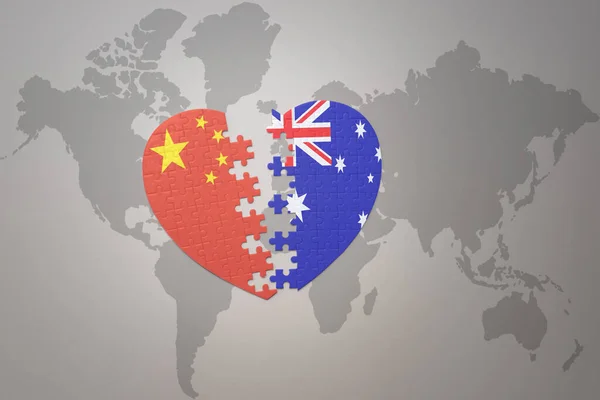 パズルハートは中国とオーストラリアの国旗を背景にした世界地図です コンセプト 3Dイラスト — ストック写真